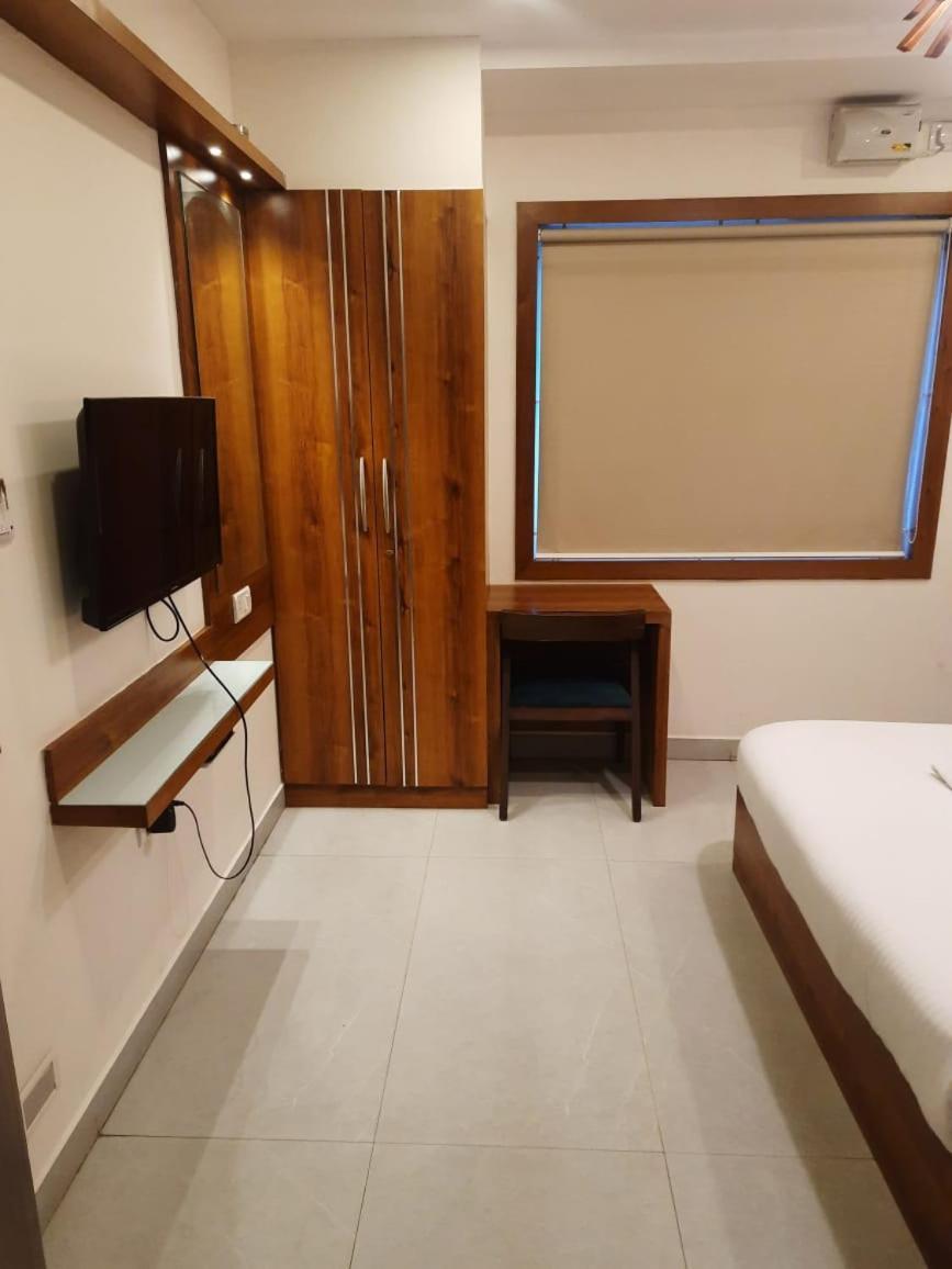 Address 24 Inn Bangalore Buitenkant foto